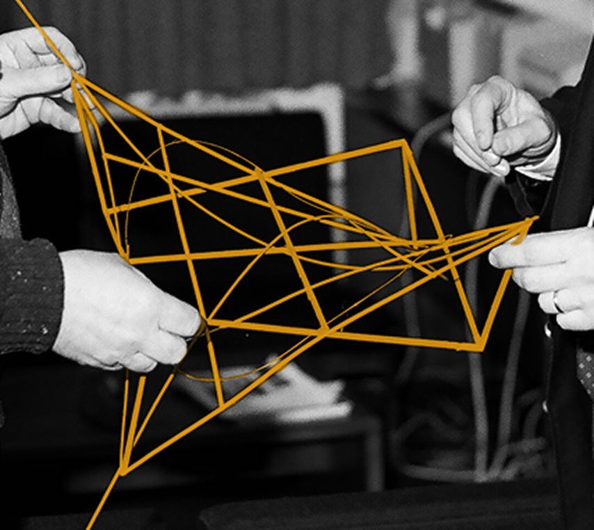Hands holding a woven sculptural object